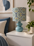 Handcrafted table lamp with turquoise base and an easy-to-clean Mediterranean-style shade